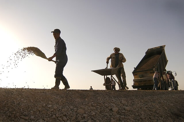 Construction Procedure Stages of Water Bound Macadam (W.B.M) Road - Spreading of Coarse Aggregates